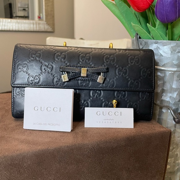 Gucci black leather Guccisimo trifold wallet with blk leather & gold tipped bow - Picture 15 of 15